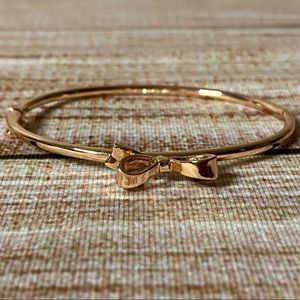 Kate Spade “Skinny Mini” Rose Gold Bow Bangle